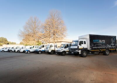 Row of delivery trucks and vans