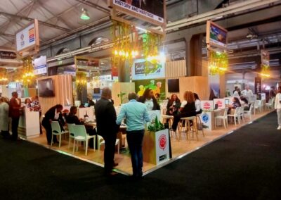 Exhibition Stand Hire Client References space with people interacting.